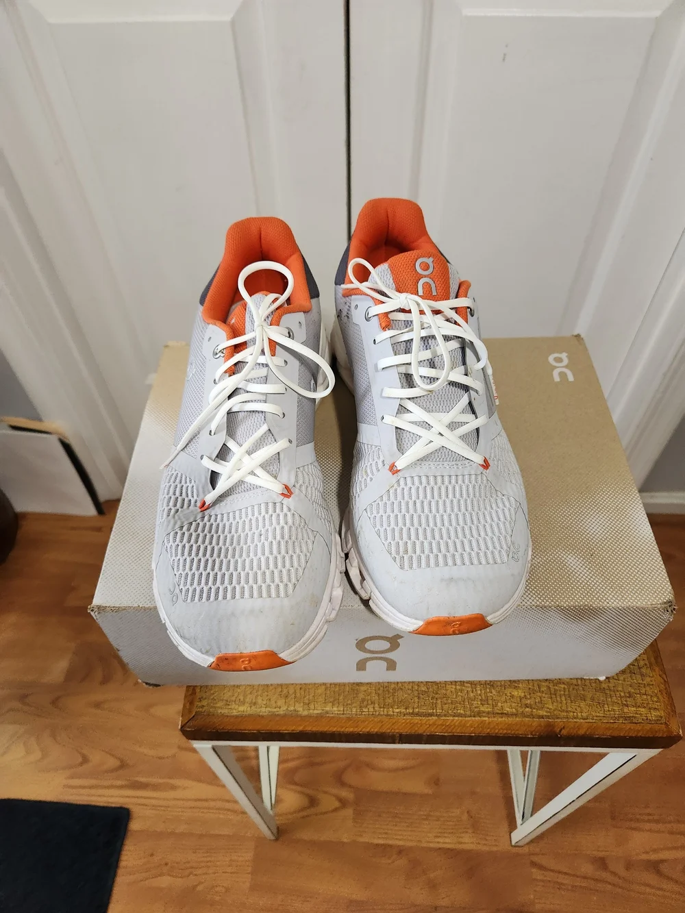 On Running Men’s White and Orange Cloudswift Running Shoes